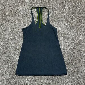 Lululemon gray racerback ruched cotton stretch tank with green stitching.